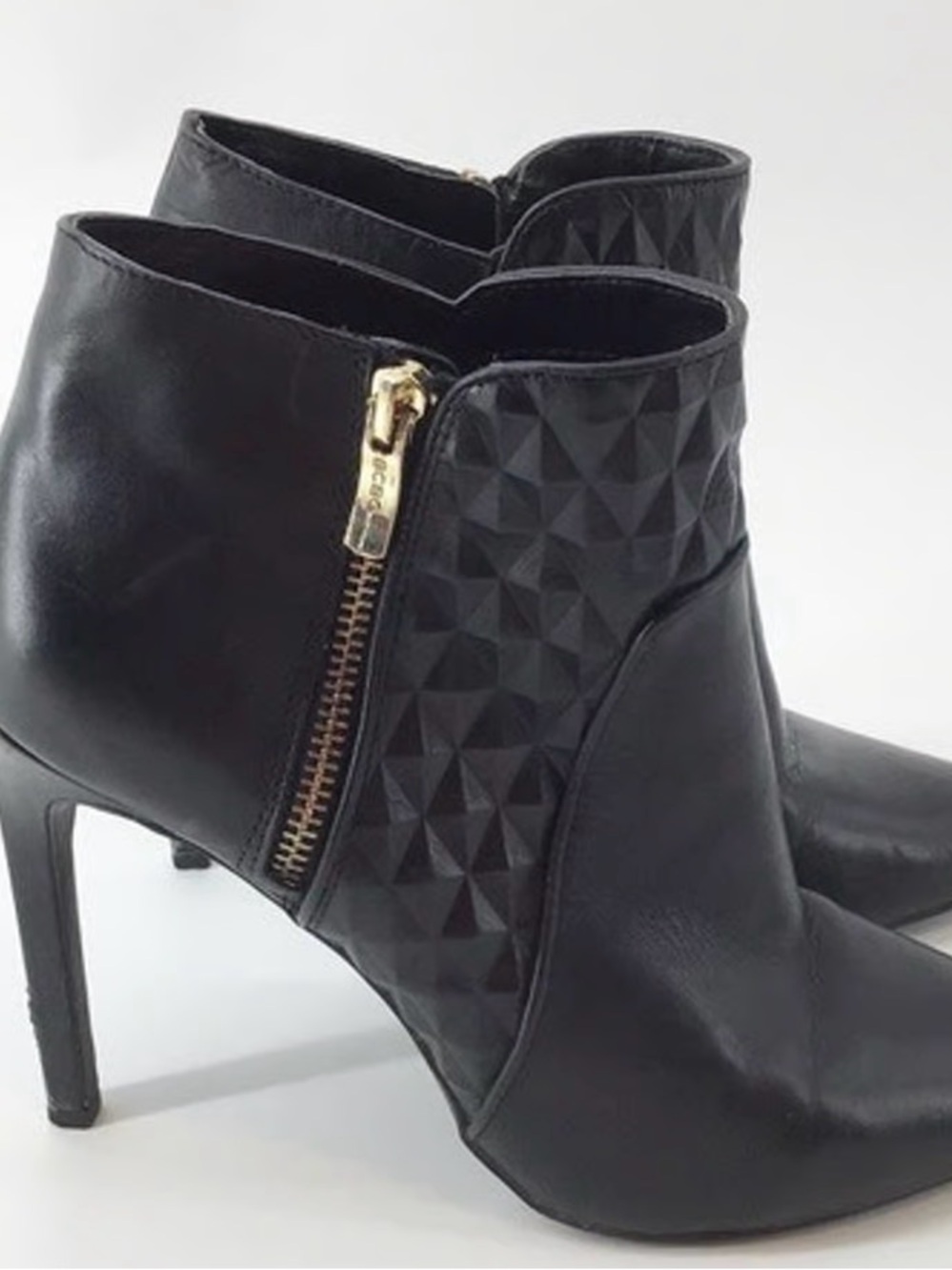 BCBGeneration Black Textured Side Zip Ankle Booties with Gold Accent